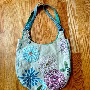 Accessorize embroidered flower imprint bag